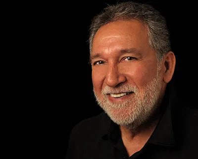 man smiling after dental bonding restored his smile